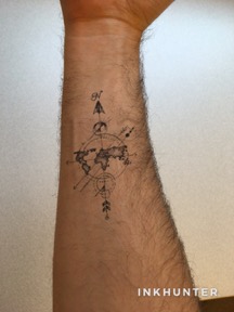 ink tattoo on arm.