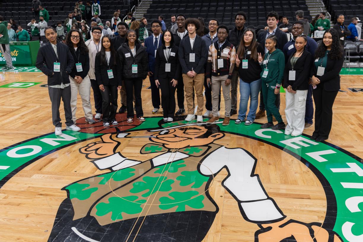 Participants in Celtics Career Day, presented by Bentley University, gather on the court at TD Gardenrden