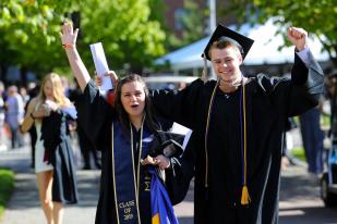 Bentley University students celebrate at graduation
