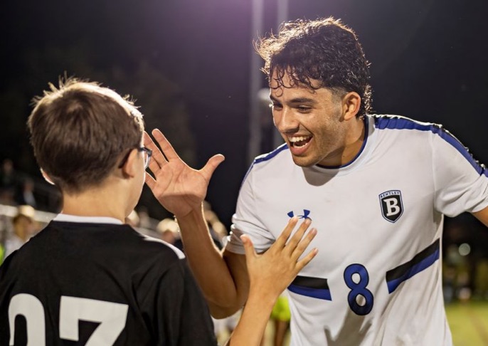 Michael Haikal ’26 coaching with Elevate Soccer