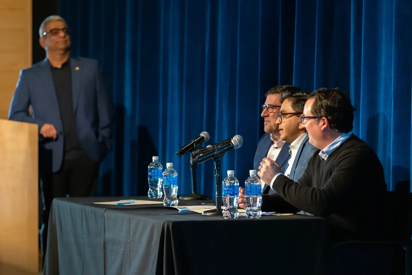 panelists and moderator at entrepreneurship event
