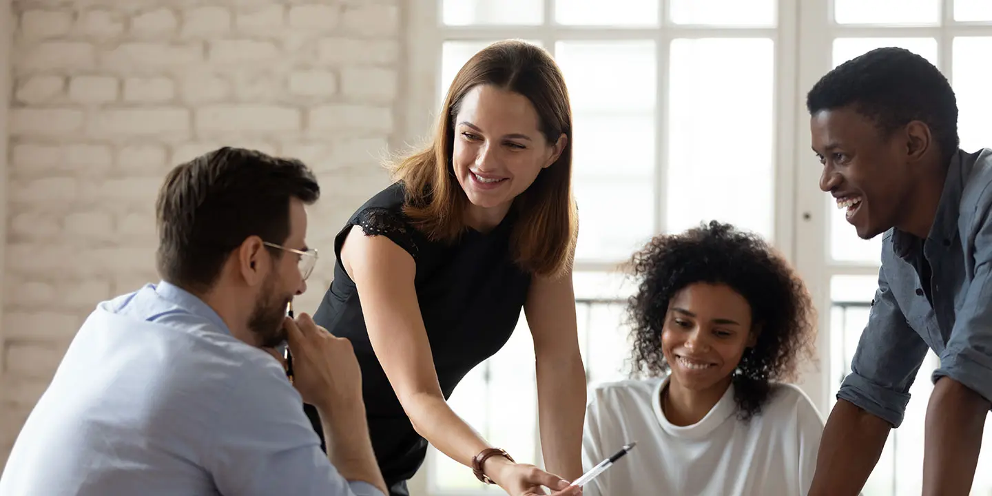 group of people engaged in active discussion during a meeting