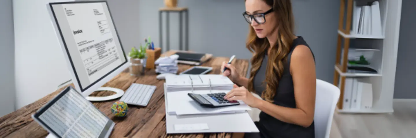 accounting professional working at a desk
