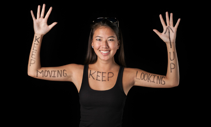 Woman with positive messages written on her body