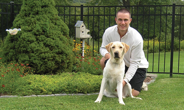 Matthew Freitag with his dog