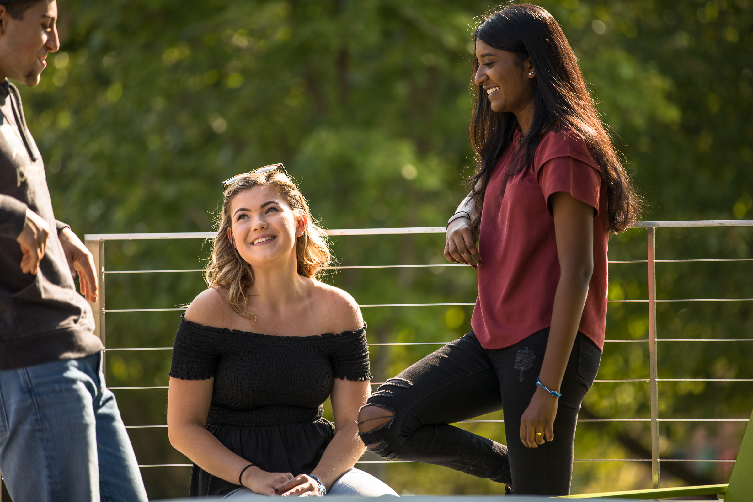  Image of three students on campus