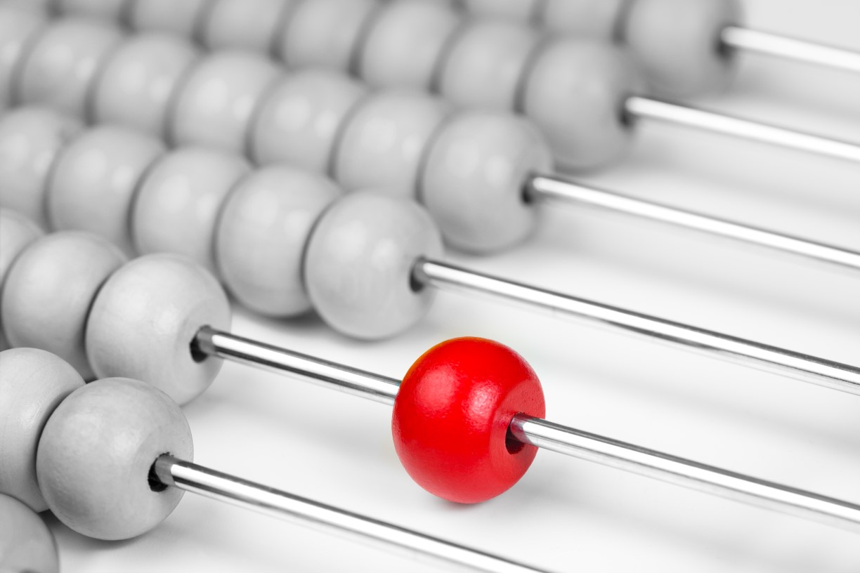 All white abacus with a single red bead