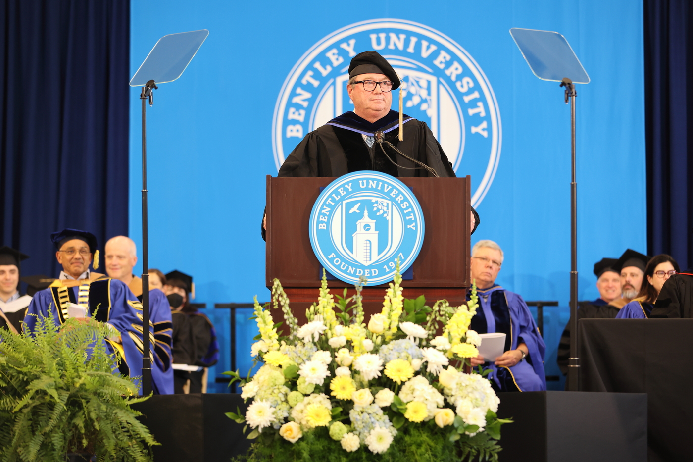 Robert Reynolds speaks at the podium