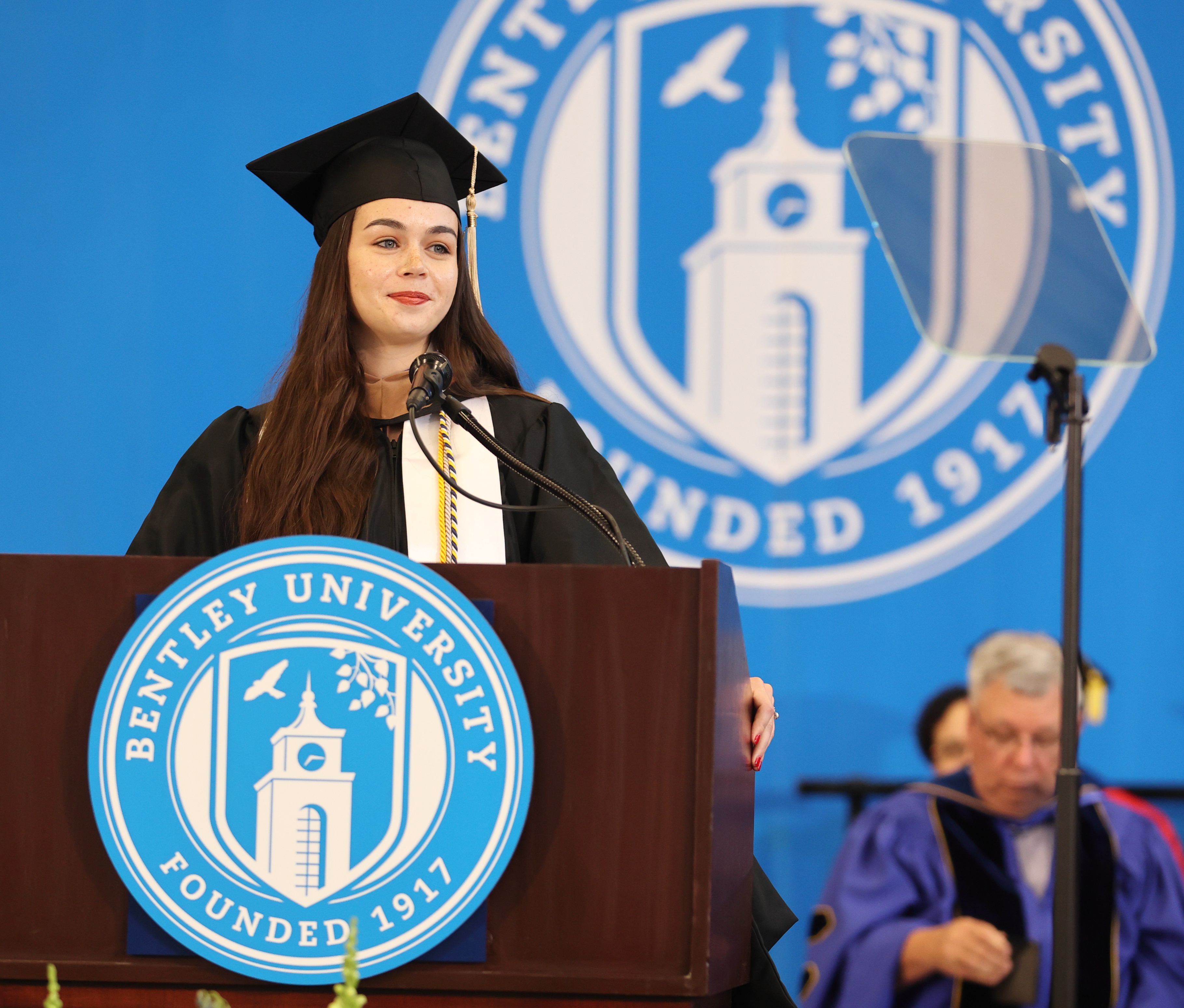 Elizaveta Borisova speaks from behind the podium 