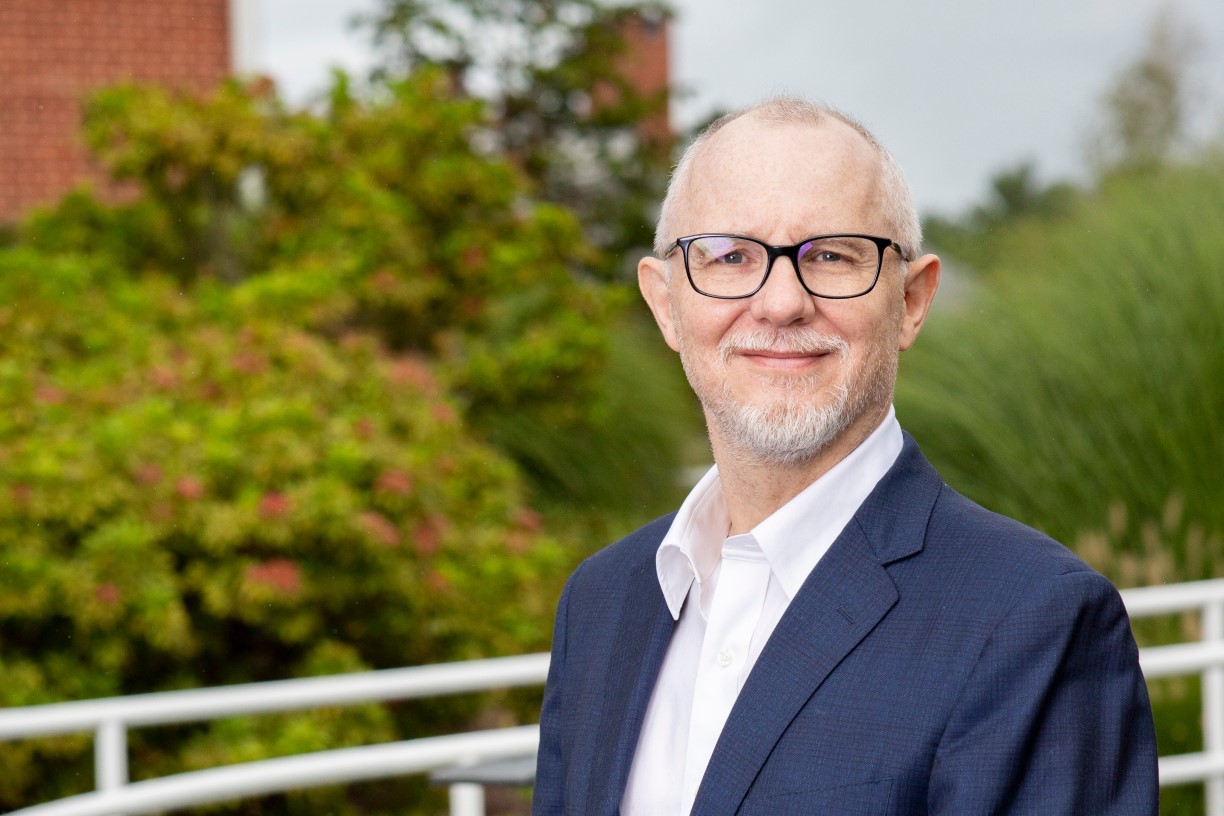 Portrait of professor Martin Conyon, taken outdoors on Bentley campus