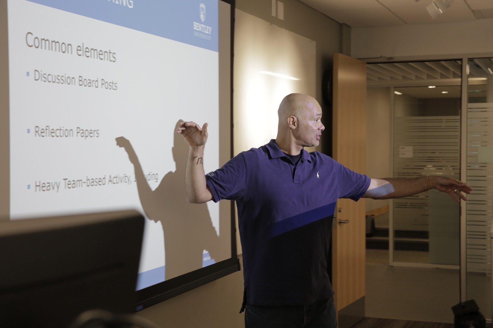 Marcus Stewart, an associate professor of management at Bentley, leads a session at the PhD Project seminar. Photos by Kevin Maguire. 