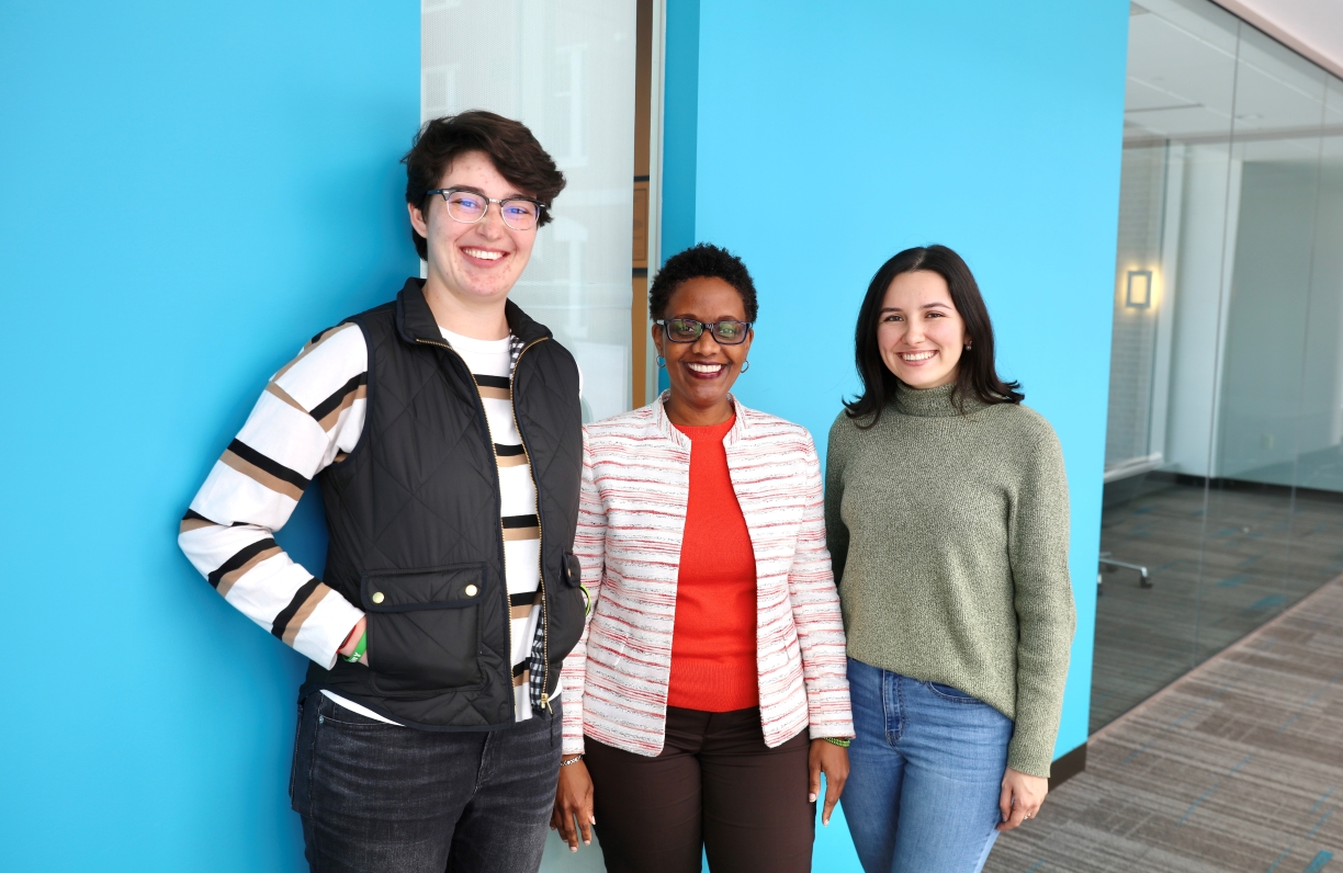 Masters of Accounting Fellows Kaitlyn Arce, left, and Juliana Balladares, right,  pose with faculty mentor Kerri-Ann Sanderson, assistant professor of Accounting.