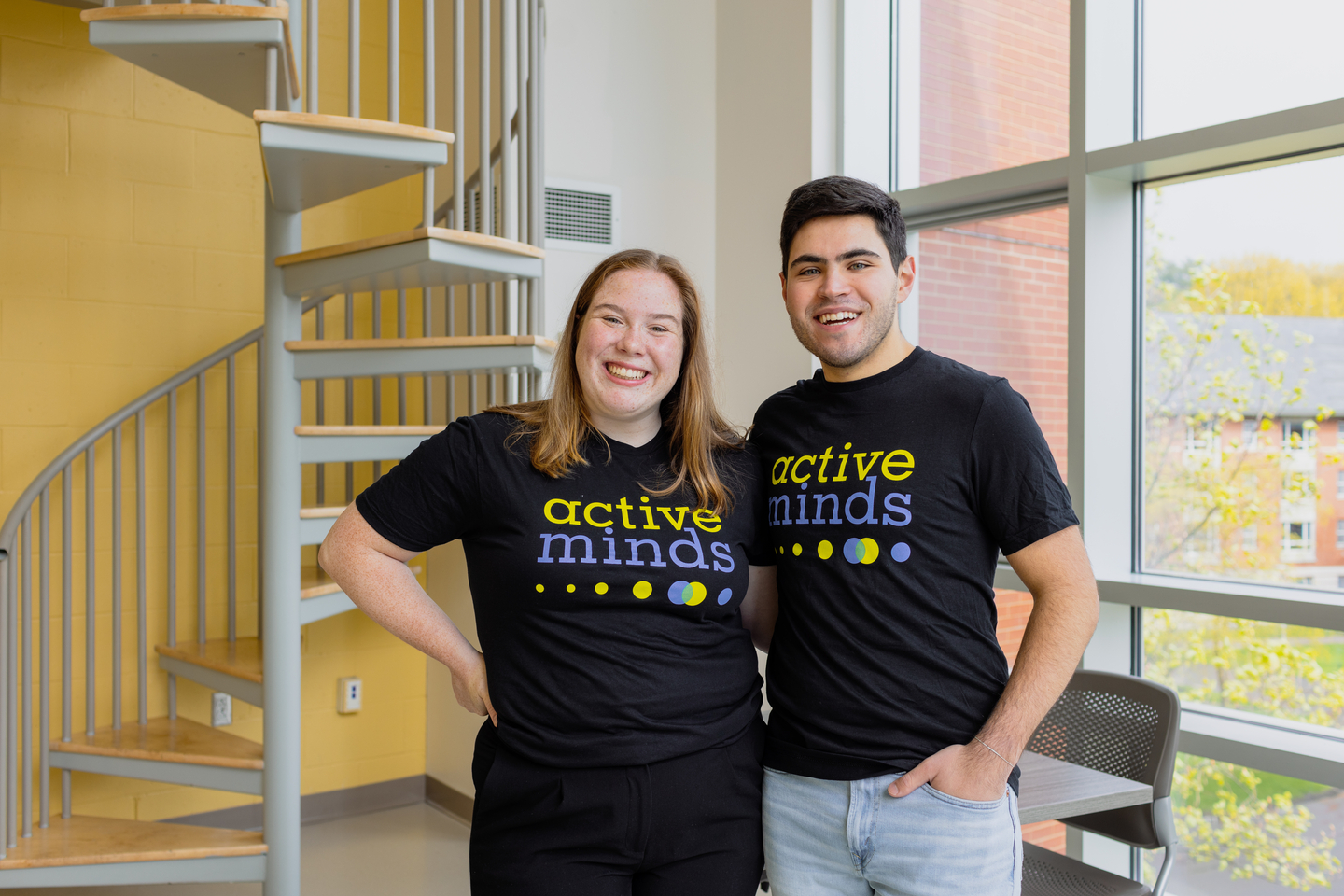 Ellie MacMillan and Joe Maselli wearing Bentley Active Minds tshirts