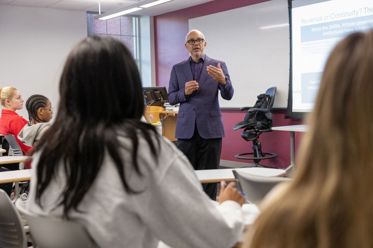 Bentley President E. LaBrent Chrite teaching first-year students in a classroom during Falcon Discovery Seminar