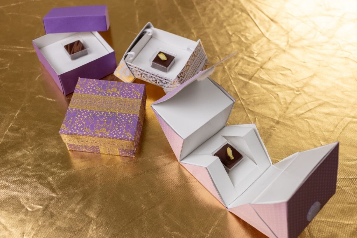 Variety of packaging for chocolates to test how package design impacts consumer perception of taste