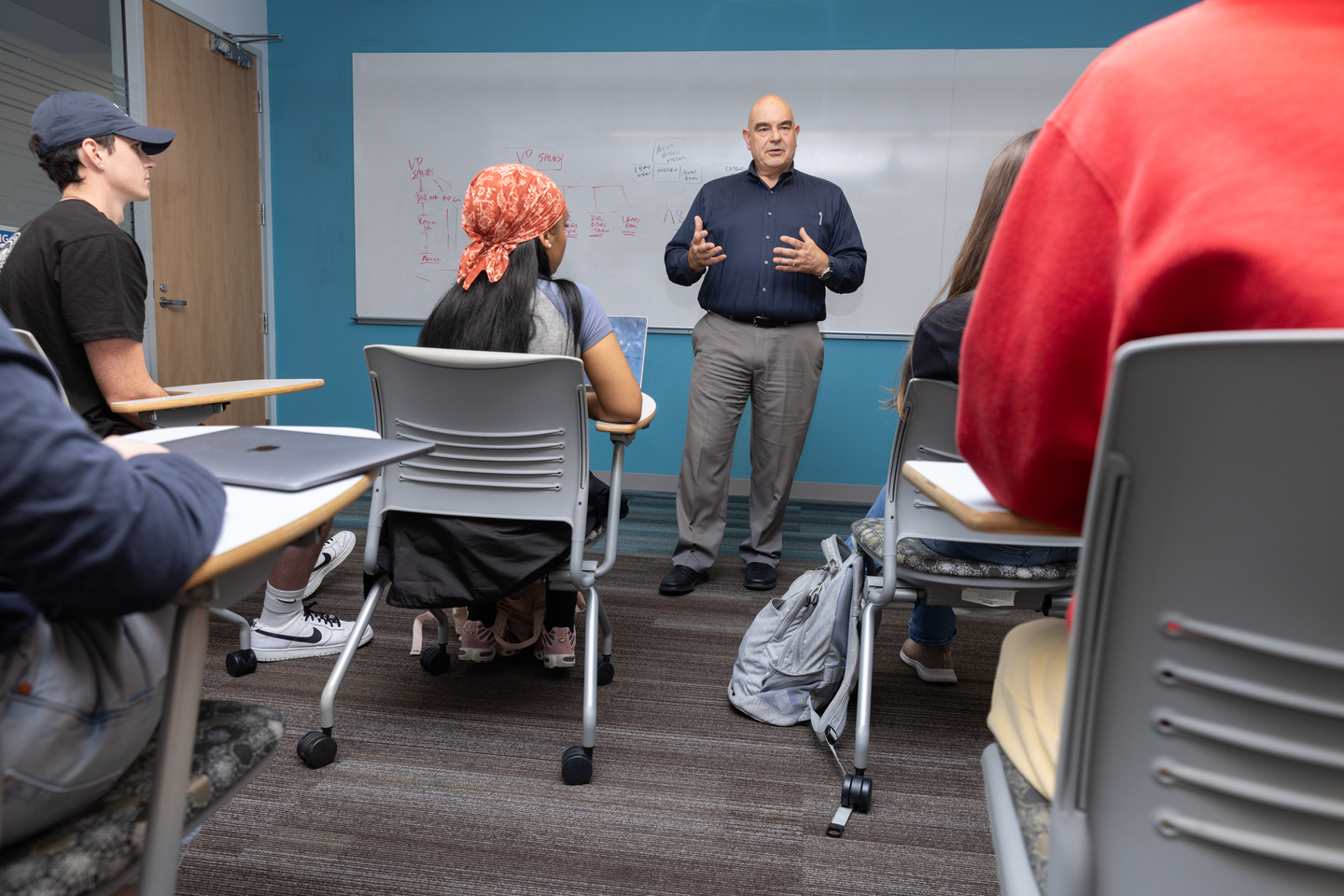 James “Pouli” Pouliopoulos teaching a course at Bentley