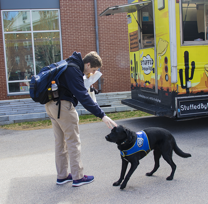 Blue with a student