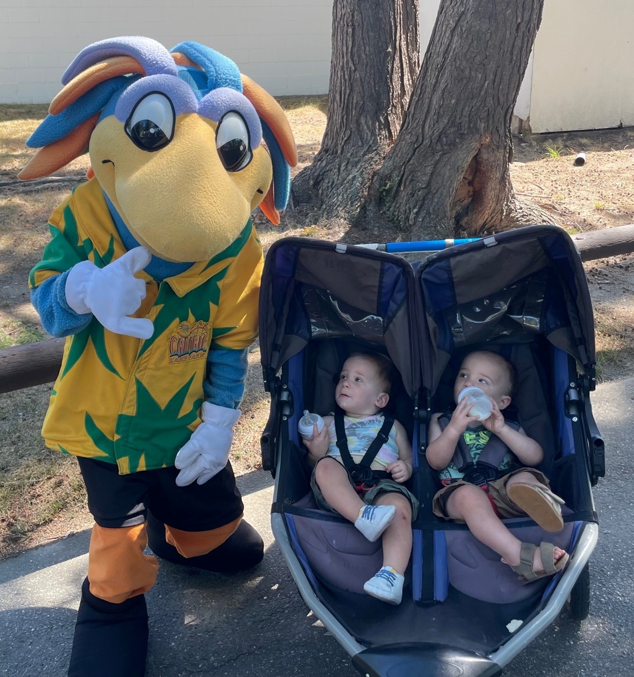 A mascot with two babies