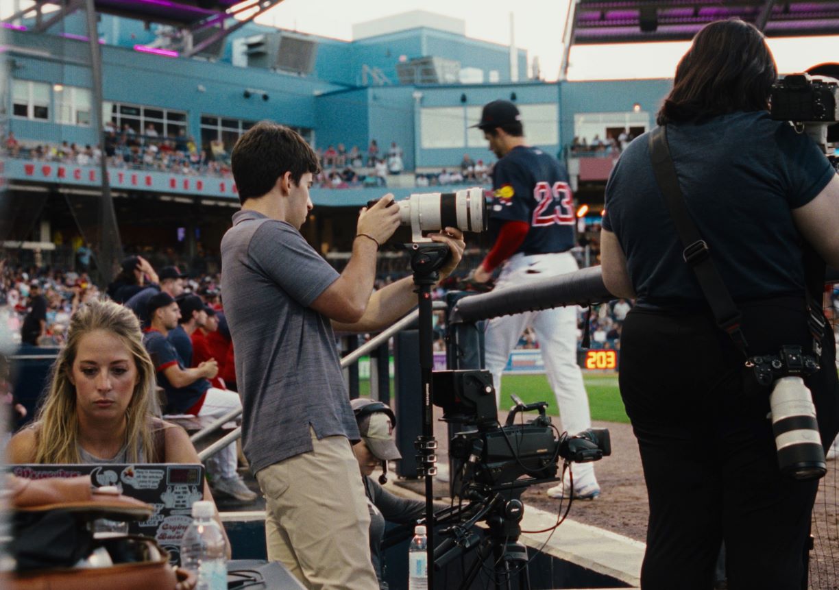 Edward Monigan IV working the video camera in the stands at Polar Park Stadium