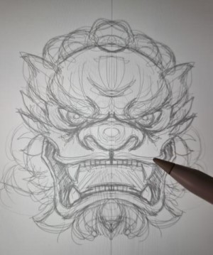 An early pencil sketch of Johnathan Yu's fu dog-inspired artwork
