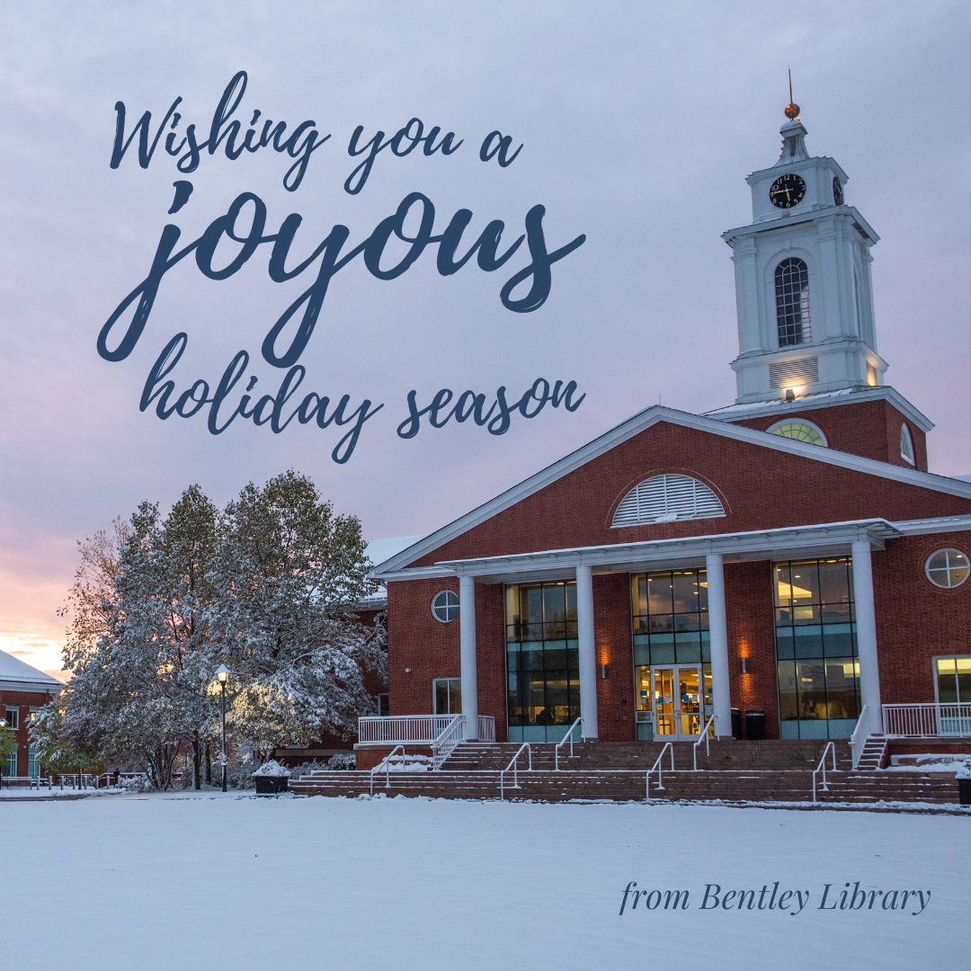 snow-covered Bentley Library and quad at sunset with text  "wishing you a joyous holiday season - from Bentley Library"