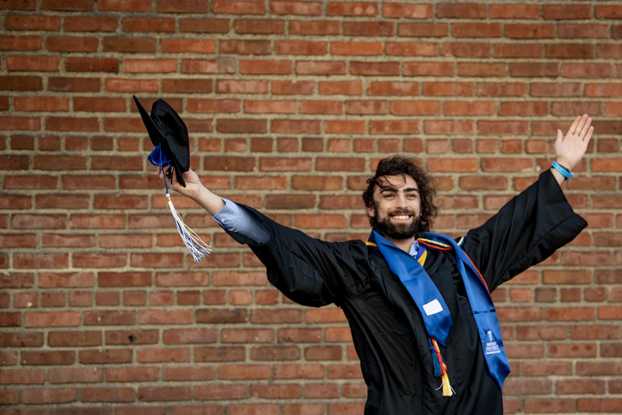 Celebrating Bentley University student at graduation