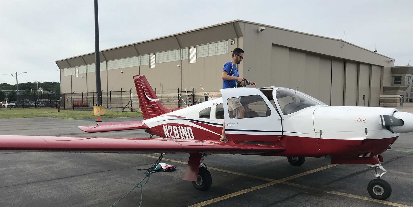 Geoff in front of a plane