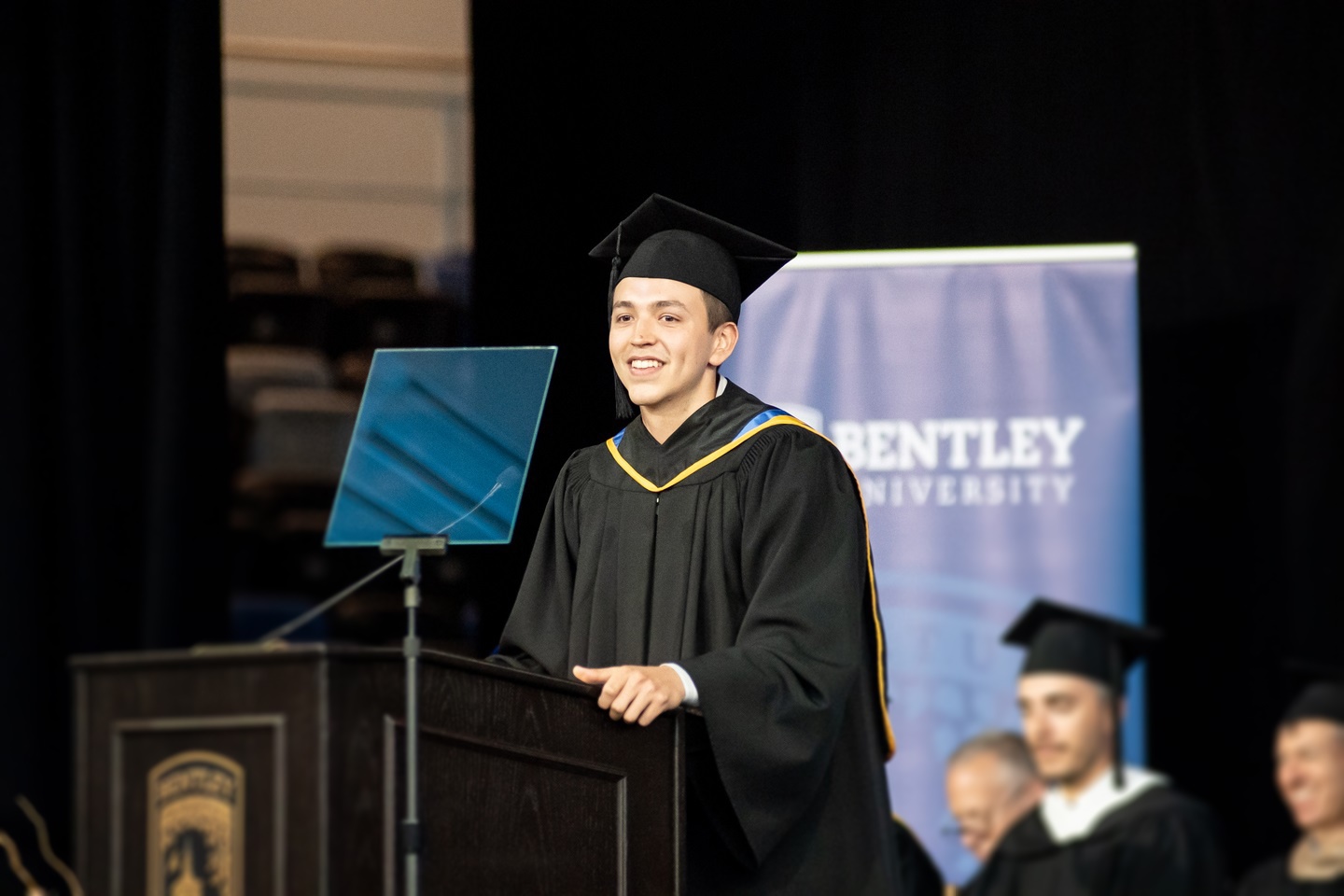 Jesse Nava speaks to incoming students at convocation in August 2019
