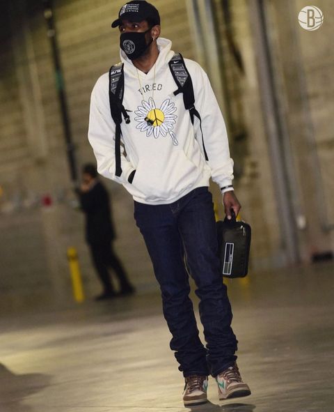 Brooklyn Nets star Kyrie Irving spotted wearing CRAV* gear before his NBA game.