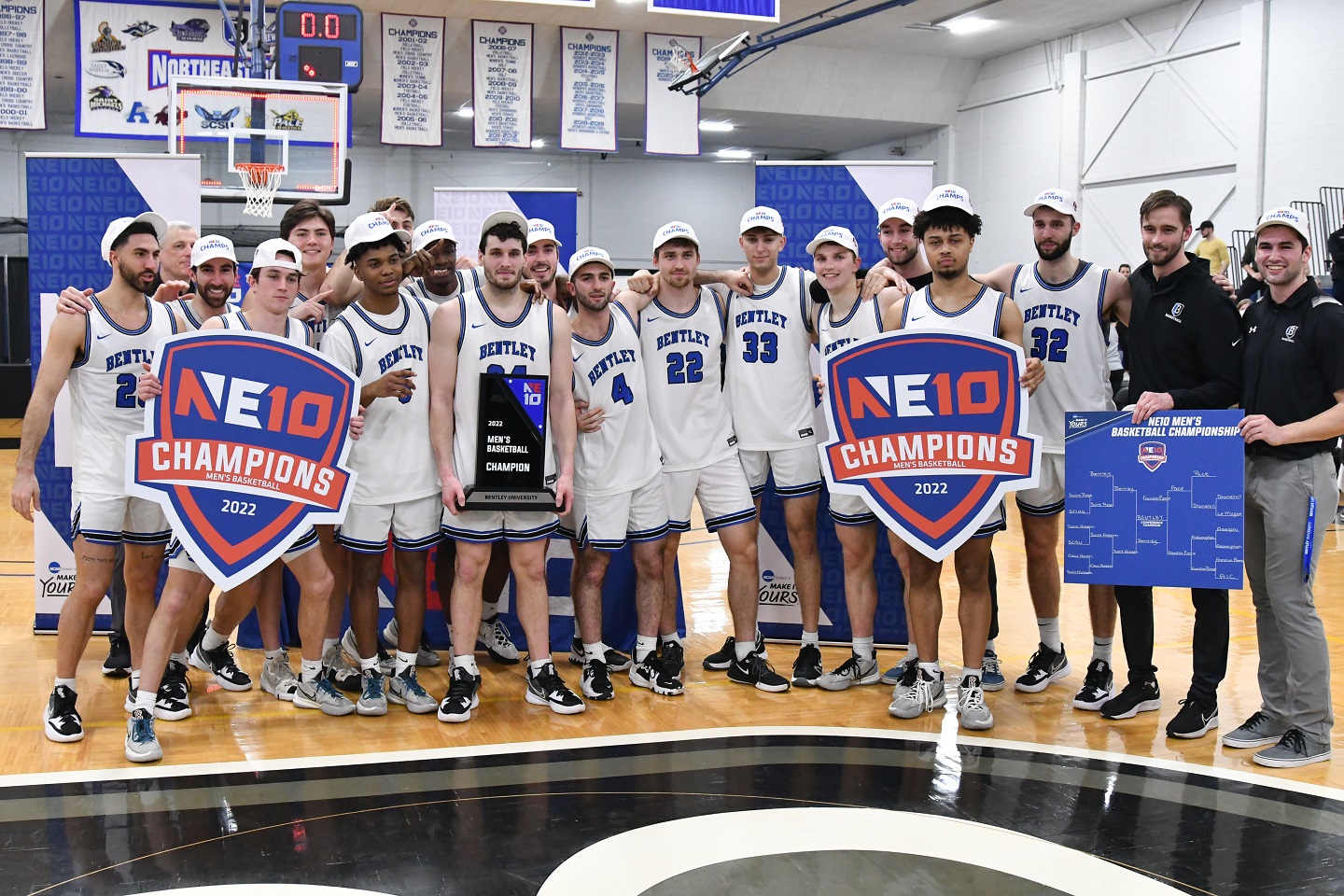 Bentley University men's basketball team celebrates the 2022 conference championship