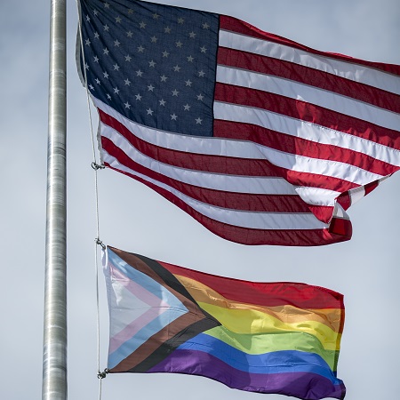 The U.S. and Progress Flags fly on the Bentley campus