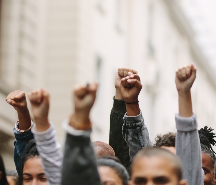 Protesters' hands in the air