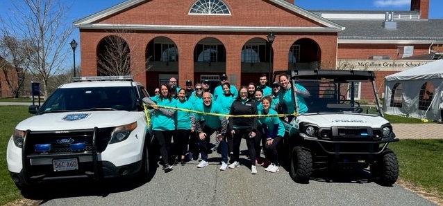 Staff members in teal after the sexual assault awareness walk