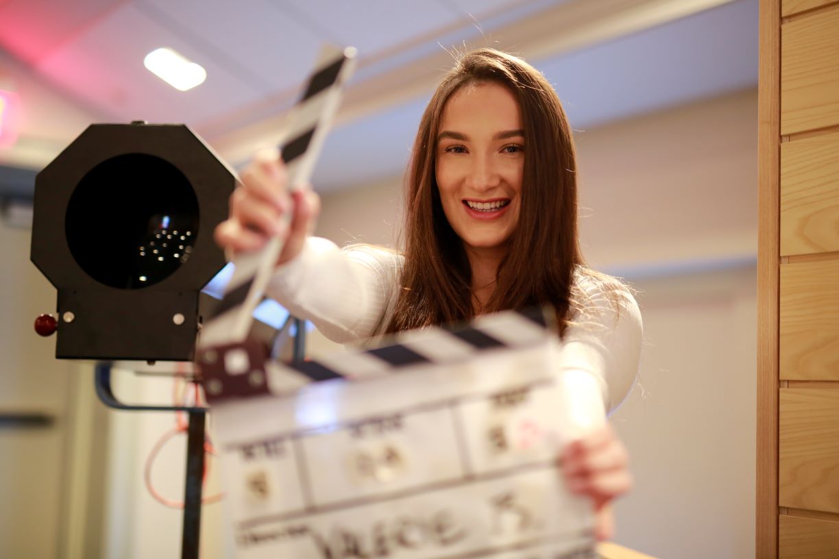 Valerie Boucher with a film slate