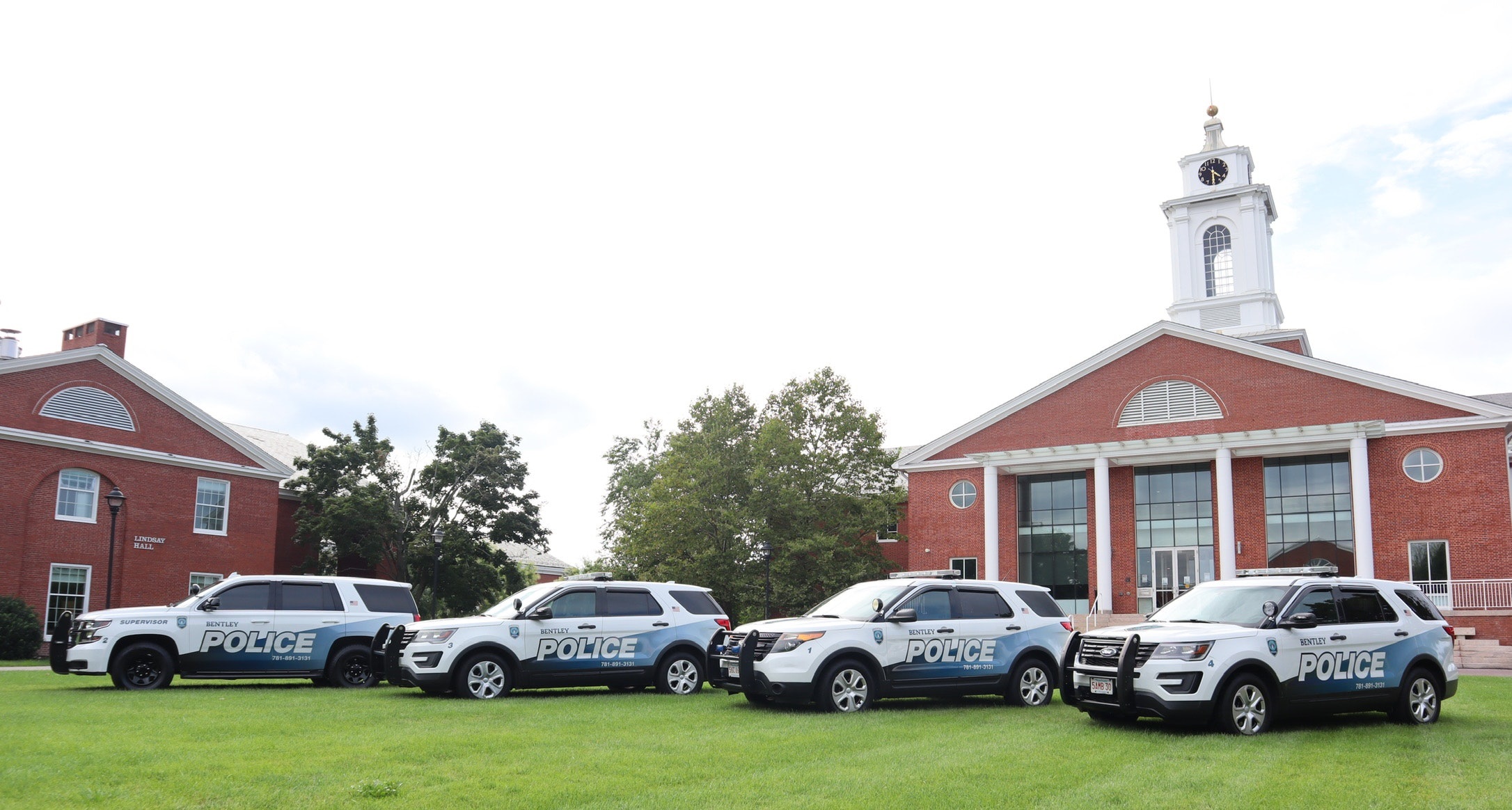 University police cruisers on the quad