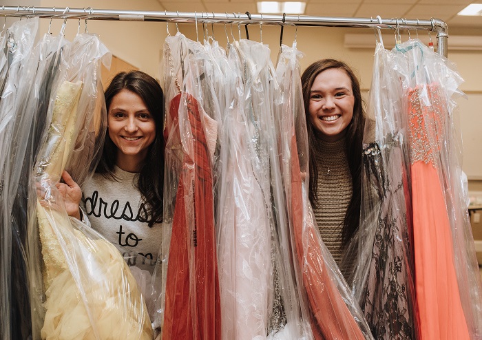 Students at Bentley University's Dresses to Dreams event