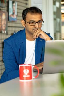 Bhavit working on computer