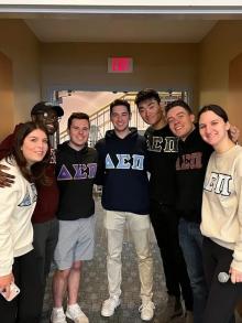 Group of students in fraternity sweatshirts
