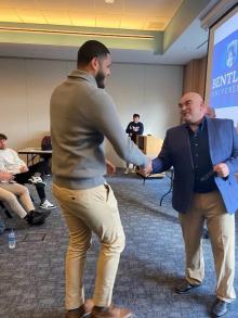 Two men shaking hands