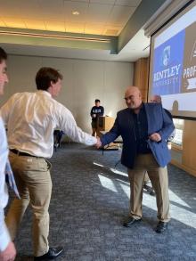 Two men shaking hands 