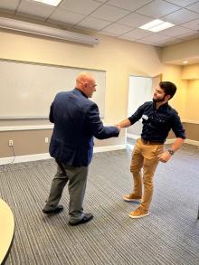 Two men shaking hands