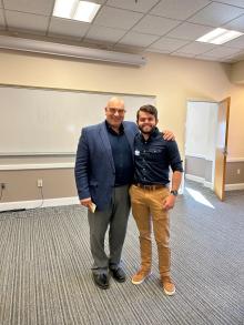 photo of two people in classroom