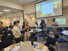 Students chatting while standing up.