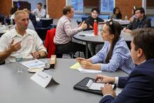 A professional from Harbourvest talking to students.