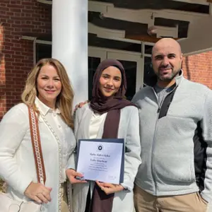 Laila Altanbour ’25 with her parents