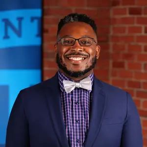 Headshot of Patrick Couillard Hale, Director of Diversity and Inclusion at Bentley University