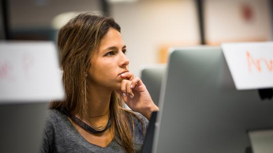 transfer student listens intently in class