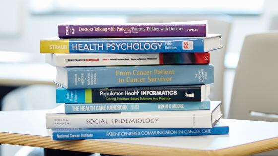 Stack of books about health-related topics