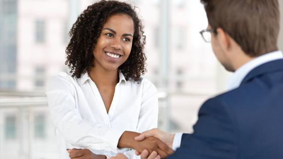 Handshake hire candidate at job interview 