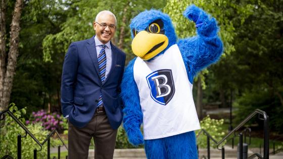 Bentley University President Brent Chrite with Flex the university mascot